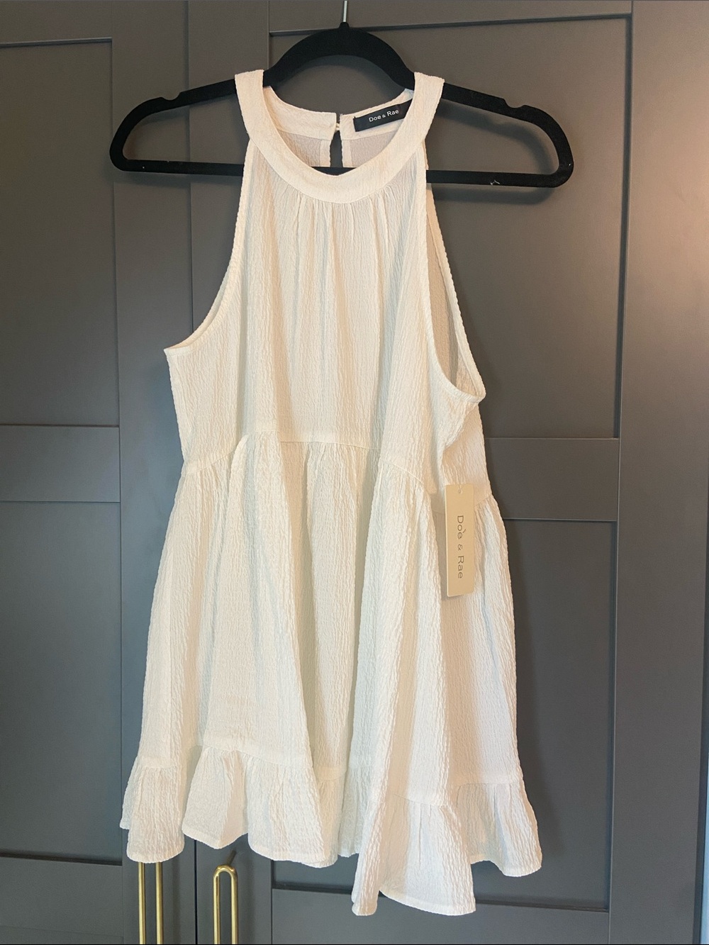 Ivory Sleeveless Ruffle-Hem Halter Tank